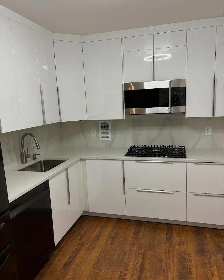 Restored kitchen with white cabinets after water damage in Folcroft